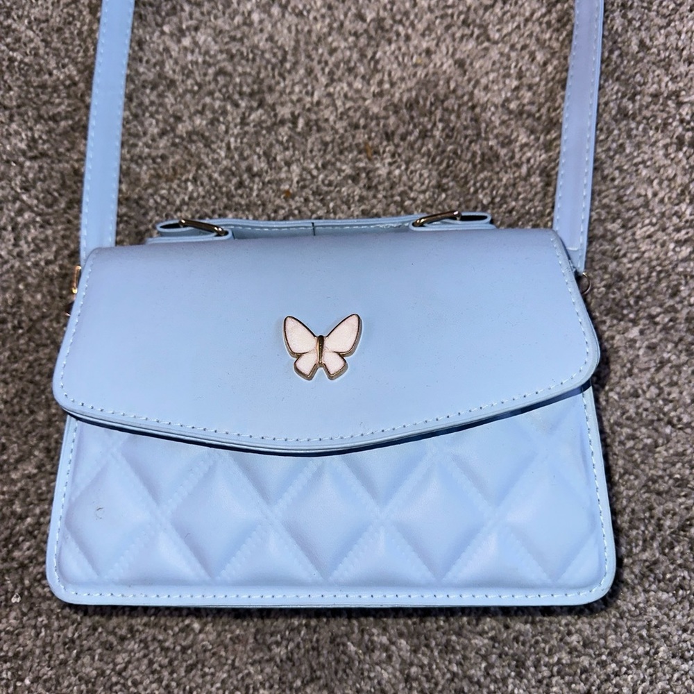 Butterfly purse and matching wallet! Never been used and brand new without tags